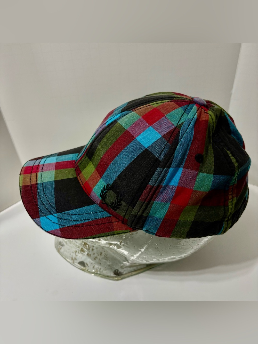 Fred Perry Black Cap with Navy Label and Light Blue Embroidery